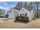 View of the home with a lush green lawn and mature trees at 4808 Hearthside Dr, Summerville, SC 29485