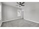 Empty room with neutral carpet, a window and ceiling fan at 524 Amalie Farms Dr, Charleston, SC 29492