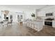 Open-concept living area features an eat-in kitchen, wood floors, and plenty of natural light at 5567 Ruby Falls Drive Ln, North Charleston, SC 29420