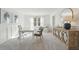 Spacious home office with ample natural light, desk, and decor at 5567 Ruby Falls Drive Ln, North Charleston, SC 29420