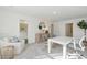 A light and bright office featuring a sitting area and desk at 5567 Ruby Falls Drive Ln, North Charleston, SC 29420