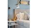 Comfortable bedroom with a platform bed, modern lighting, and decorative accents for a cozy ambiance at 5569 Ruby Falls Drive Ln, North Charleston, SC 29420