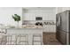 Modern kitchen featuring white cabinets, granite countertops, stainless appliances and stylish accents at 5569 Ruby Falls Drive Ln, North Charleston, SC 29420