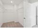 An empty walk-in closet with wire shelving offers ample storage and organization space at 5571 Ruby Falls Dr, North Charleston, SC 29420