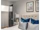 Comfortable bedroom featuring plush bedding and soft lighting at 7 Logan St # F, Charleston, SC 29401