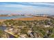 Picturesque aerial view of a waterfront community with the cityscape in the background at 728 N Godfrey Park Pl, Charleston, SC 29407