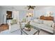 Living room featuring comfortable seating and an open view of the kitchen at 728 N Godfrey Park Pl, Charleston, SC 29407