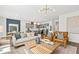 Stylish open concept design featuring modern furniture, décor, and lighting fixtures at 746 Meadowbrook Lane, Summerville, SC 29486