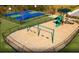 Community playground with swings and a slide, surrounded by a safety fence at 746 Meadowbrook Lane, Summerville, SC 29486