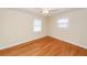 Bedroom with hardwood floors, ceiling fan, and natural light from two windows at 8 Shrewsbury Rd, Charleston, SC 29407