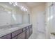 Bathroom boasts a granite countertop vanity, large mirror, and access to a tiled shower and toilet at 94 Dean Dr, Summerville, SC 29483