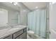 Bathroom featuring vanity with granite countertops, toilet, and shower-tub combination with curtain at 94 Dean Dr, Summerville, SC 29483
