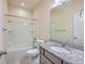Bathroom featuring a granite countertop vanity, toilet, and shower-tub combination with a shower head at 94 Dean Dr, Summerville, SC 29483
