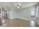 Open-concept living room with hard wood flooring and neutral walls, great for entertaining guests at 94 Dean Dr, Summerville, SC 29483