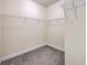 Walk-in closet features carpet, base trim, wire shelving and neutral paint at 94 Dean Dr, Summerville, SC 29483