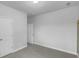 Carpeted bedroom with two doors, a ceiling light, and white walls at 96 Dean Dr, Summerville, SC 29483