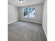 Sunlit carpeted bedroom with a double window and a view of the outdoors at 96 Dean Dr, Summerville, SC 29483