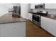 Modern kitchen featuring granite countertops, stainless steel appliances and a central island at 96 Dean Dr, Summerville, SC 29483