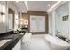 Bright bathroom featuring a soaking tub, elegant tile flooring, dual sinks, and plantation shutters at Lot 20 Bulow Landing Rd, Hollywood, SC 29470