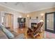 Comfortable living room featuring a fireplace, hardwood floors, and a cozy seating area at 102 Barnaby St, Charleston, SC 29492