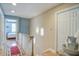 Hallway with hardwood floors and a partial view into a bedroom at 102 Barnaby St, Charleston, SC 29492