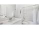 Bright bathroom showcasing a white vanity, mirror, toilet, and a bathtub-shower combination at 1049 Tea Time Dr, Summerville, SC 29485