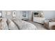 Bedroom highlighting a dresser, accent chair, and comfortable bed with patterned bedding at 1049 Tea Time Dr, Summerville, SC 29485