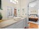 Bathroom with vessel sink and view into the main bedroom at 109 White Pine Way, Summerville, SC 29485