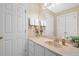 Bathroom featuring vanity with sink, white cabinets and doors, and neutral countertops at 109 White Pine Way, Summerville, SC 29485