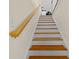 Staircase with hardwood steps and white risers, leading to the upper level at 109 White Pine Way, Summerville, SC 29485