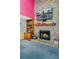 Living room fireplace with brick surround, mantel, and built-in shelving, creating a cozy focal point at 112 River Oak Ln, Charleston, SC 29418