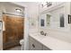 Modern bathroom with stone shower and black hardware for a sleek, updated look at 1121 Summer Wind Ln, Seabrook Island, SC 29455
