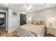 Comfortable bedroom features wood floors, ceiling fan, and ample natural light for a cozy retreat at 1121 Summer Wind Ln, Seabrook Island, SC 29455