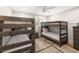 Charming bedroom with bunk beds and cozy rug, perfect for or guests at 1121 Summer Wind Ln, Seabrook Island, SC 29455