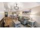 Cozy living room with stylish decor, hardwood floors, and a comfortable seating area at 1121 Summer Wind Ln, Seabrook Island, SC 29455