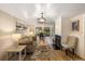 Comfortable living room featuring modern lighting, a fireplace, and hardwood floors at 1121 Summer Wind Ln, Seabrook Island, SC 29455