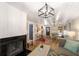 Inviting living room with a fireplace, hardwood floors, and modern decor at 1121 Summer Wind Ln, Seabrook Island, SC 29455
