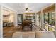 Inviting living space bathed in natural light, showcasing wood floors and neutral tones with seamless flow at 1121 Summer Wind Ln, Seabrook Island, SC 29455