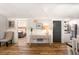Welcoming living space with wood floors providing seamless transition between rooms at 1121 Summer Wind Ln, Seabrook Island, SC 29455