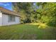 Spacious backyard with healthy lawn and shade trees at 114 Tennyson Way, Summerville, SC 29486