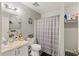 Simple bathroom with vanity, toilet, tub/shower combo, and built in storage, creating a functional space at 114 Tennyson Way, Summerville, SC 29486
