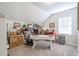 Attic space converted to a craft room with desk and organization at 1261 Gannett Rd, Mount Pleasant, SC 29464