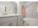 Modern bathroom featuring double vanity, tub, and neutral tile at 1261 Gannett Rd, Mount Pleasant, SC 29464