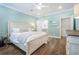 Stylish bedroom with a light blue color scheme and hardwood floors at 1261 Gannett Rd, Mount Pleasant, SC 29464