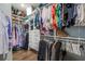Walk-in closet with custom shelving and hanging rods offering organized storage for clothing and accessories at 1261 Gannett Rd, Mount Pleasant, SC 29464