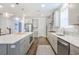 Modern kitchen featuring stainless steel appliances, gray cabinets, and a spacious center island at 1261 Gannett Rd, Mount Pleasant, SC 29464