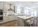 Modern kitchen featuring a large island, stainless steel appliances, and ample counter space at 1261 Gannett Rd, Mount Pleasant, SC 29464