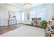 Bright living room with hardwood flooring, chandeliers, and a cozy atmosphere at 1261 Gannett Rd, Mount Pleasant, SC 29464