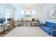 Bright living room with hardwood flooring, chandeliers, and a cozy atmosphere at 1261 Gannett Rd, Mount Pleasant, SC 29464