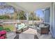 Spacious screened patio with outdoor seating area and backyard view at 1261 Gannett Rd, Mount Pleasant, SC 29464